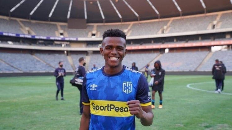 The former Young Bafana player Eyona Ndondo standing in a big soccer stadium in South Africa.